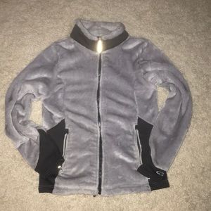 A grey jacket size 10-12 large for kids
